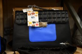 An as new Nova Harley Luxury Athens leather changing bag.
