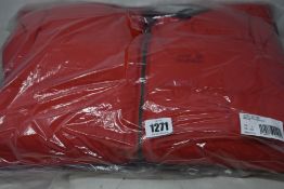 An as new Jack Wolfskin Crystal Palace coat in coral red (S).