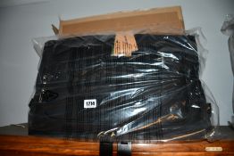 An as new Samsonite Respark tri-fold garment bag.