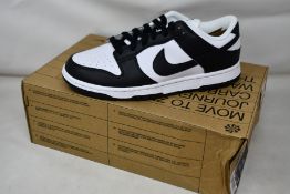 A pair of women's as new Nike Low Next Nature (UK 5).
