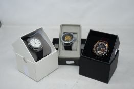 Three men's as new Vault automatic watches.