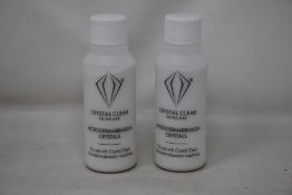 A box of as new Crystal Clear Skincare microdermabrasion crystals (52 bottles per box, 85g