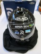 An as new HJC RPHA 90S motorcycle helmet in Carbon.
