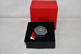 A gents as new Hugo Boss Smash wrist watch.