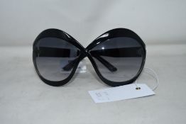 A pair of as new Tom Ford sunglasses (No case - RRP £285).