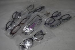 Twelve pairs of assorted as new Booth & Bruce glasses frames.