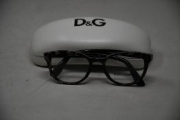 A pair of as new Dolce & Gabbana glasses frames.