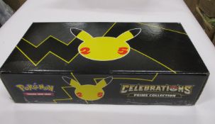Two as new Pokemon 25th Anniversary Prime Collection boxes.