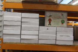 Fifty boxed as new A Christmas Elf Magical Reward kits.