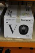 A boxed as new Cuckoo HVB0680SS rice cooker (Requires UK power adaptor).