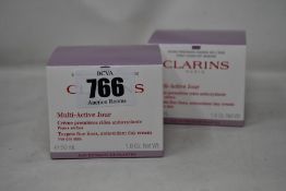 Four as new Clarins Targets Fine Lines antioxidant day creams (4 x 50ml).