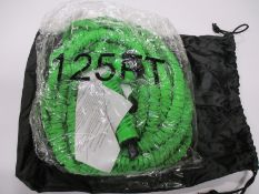 A box of nineteen garden hose pipes (125ft).