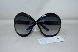 A pair of as new Tom Ford sunglasses (No case - RRP £285).