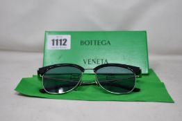 A pair of pre-owned Bottega Veneta sunglasses (Very good condition).
