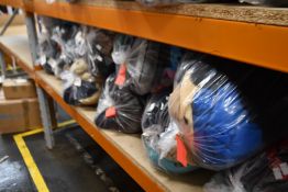 Eleven bags of pre-owned clothing and related items.