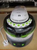 A pre-owned Breville Halo healthy way to cook Airfryer with instruction booklet.