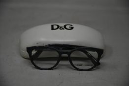 A pair of as new Dolce & Gabbana glasses frames.