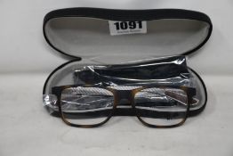 A pair of as new Ray Ban glasses frames.