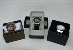 Three men's as new Vault automatic watches.
