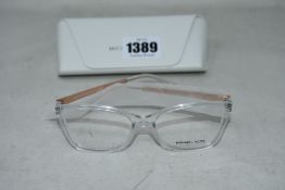 A pair of as new Michael Kors glasses frames.