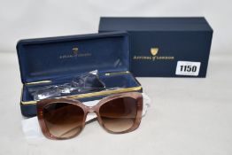 A pair of women's as new Aspinal of London sunglasses.