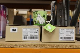 Two boxes of six as new Arabia Moomin mugs with Moomintroll grass-green design.