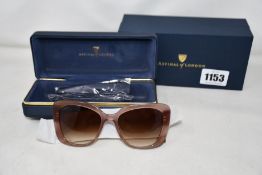 A pair of women's as new Aspinal of London sunglasses.