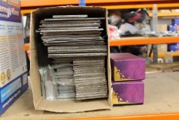 A quantity of Keyforge TCG products to include multiple decks, paper playmats and other.