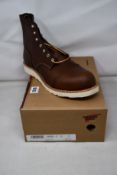 A pair of as new Red Wing Shoes Iron Ranger boots (UK 11).