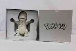 A boxed as new Pokemon x Daniel Arsham white crystalized charmander (12.9in figurine, Limited