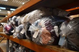 Eleven bags of pre-owned clothing and related items.