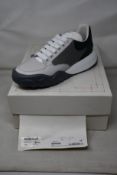 A pair of as new Alexander McQueen low top sneakers (EU 41).