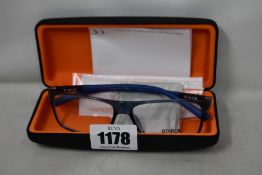 A pair of as new Starck glasses frames.