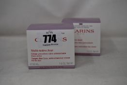 Four as new Clarins Targets Fine Lines antioxidant day creams (4 x 50ml).