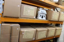 Eighteen boxed Christmas Enchanted Bungalows with LED lights.