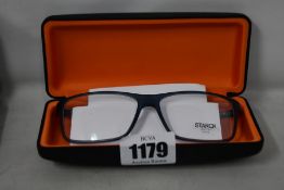 A pair of as new Starck glasses frames.