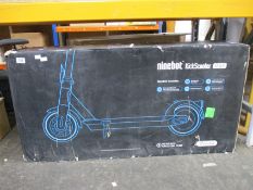 A boxed Segway Ninebot Kickscooter MAX G30D II electric scooter.