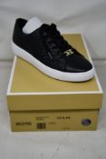 A pair of as new Michael Kors Keaton lace up sneakers (US 6.5M).