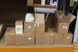 Eight Modern Souvenir handmade bookends and five handmade paperweights.