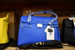 An as new Nova Harley Luxury Elegant Blue leather changing bag.