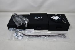 Three gents assorted as new Hugo Boss bracelets; brown leather bracelet 1580149M (RRP £69), chain