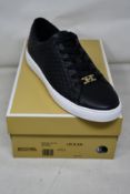 A pair of as new Michael Kors Keaton lace up sneakers (US 9.5M).