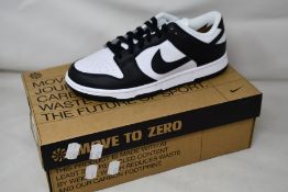 A pair of women's as new Nike Low Next Nature (UK 6).