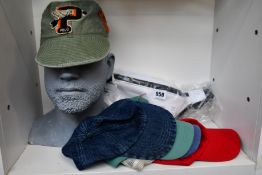 Five assorted as new Ralph Lauren baseball caps and a waist bag.