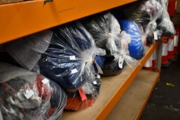 Ten bags of pre-owned clothing and related items.