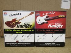 A large quantity of as new Woodie's invisible electric guitar hangers (Approximately 80).
