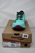 A pair of women's as new Saucony Xodus Ultra trainers (UK 6).
