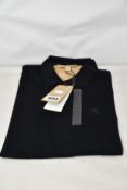 Three as new Burberry polo shirts in black (XL - RRP £79 each).