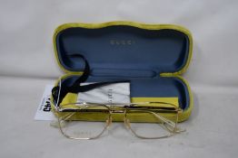 A pair of as new Gucci glasses frames (RRP £296).