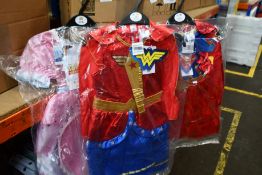 Fifteen girls as new fancy dress costumes; five Toy Story Bo Peep, five Wonder Woman and five